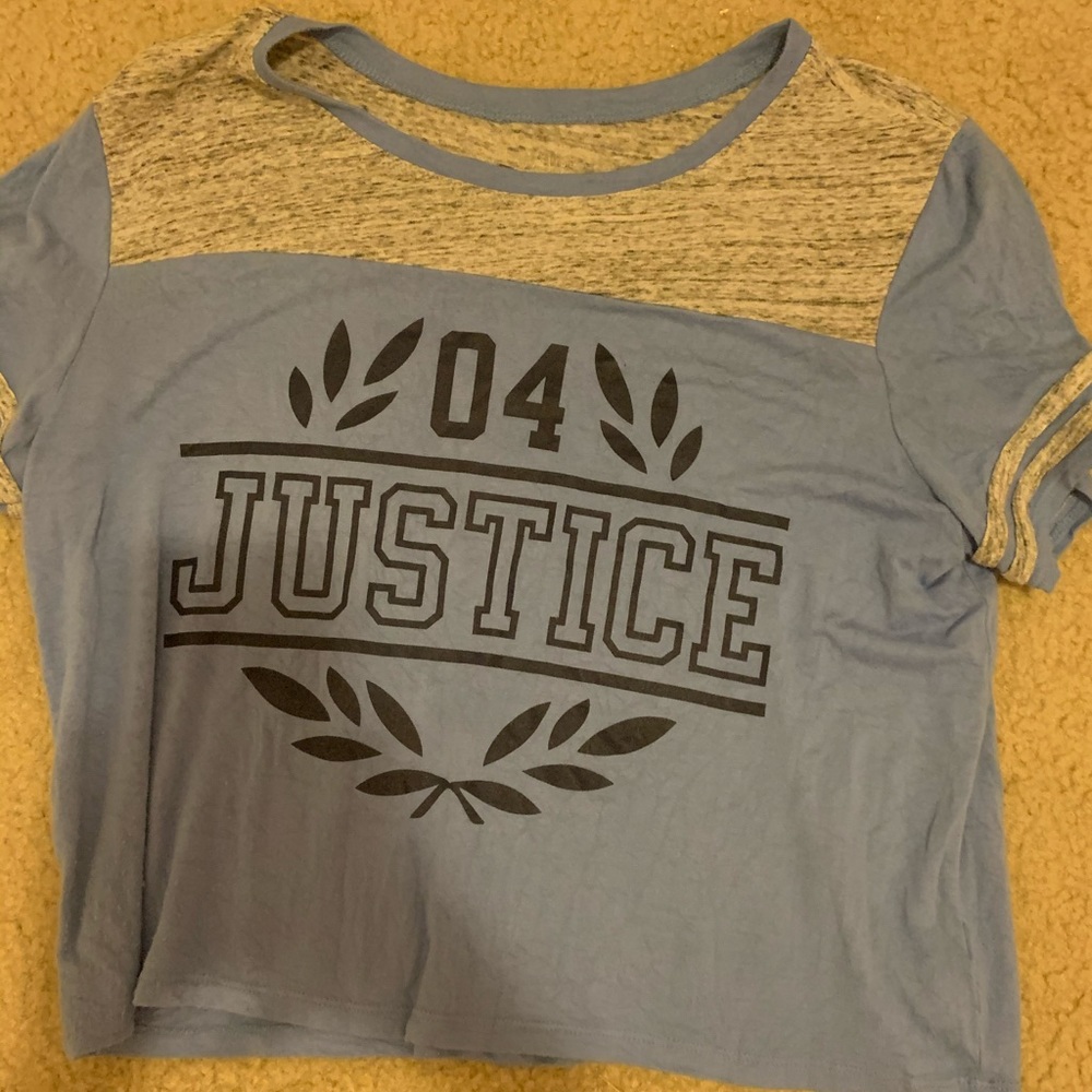 light blue girls Justice shirt.